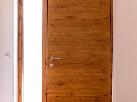Holz- Haustüre in Eiche geölt mit Fixteil aus Glas
